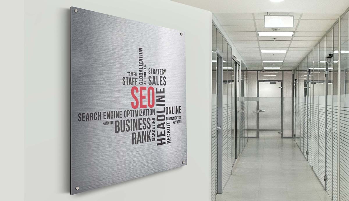 brushed aluminum hallway entrance sign