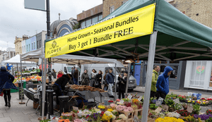 flower business canopy tent banner at farmers market