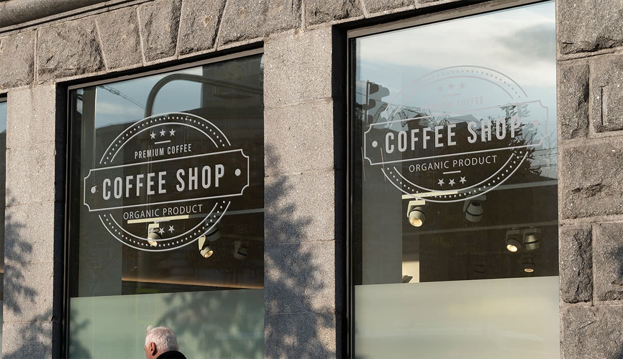 coffee shop windows with standard cut frosted vinyl of logo
