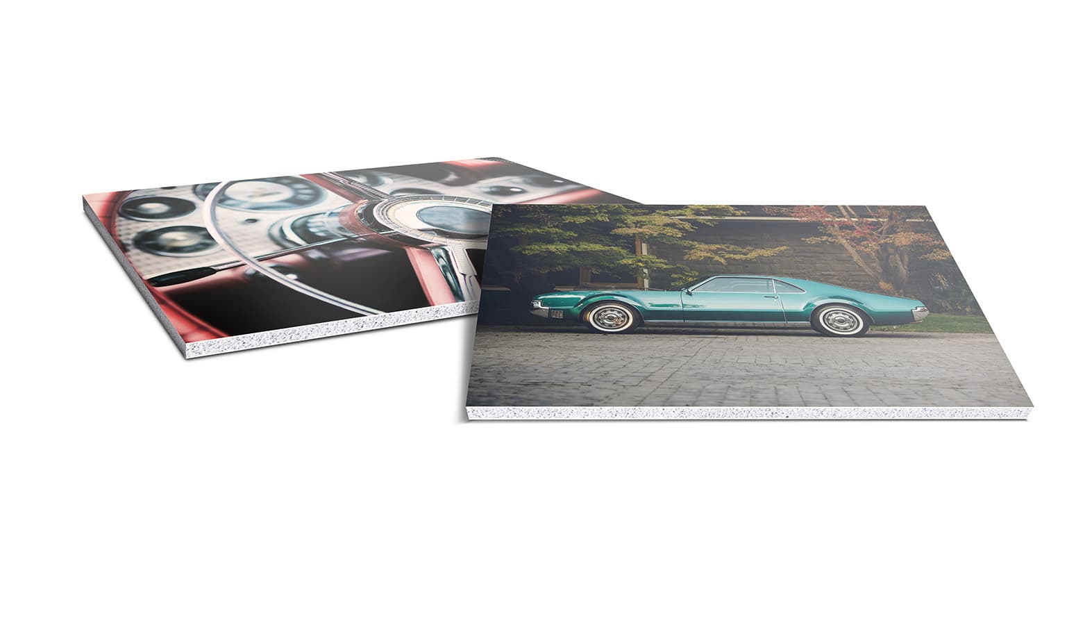 two ultra board classic car prints of classical cars laying flat on white background