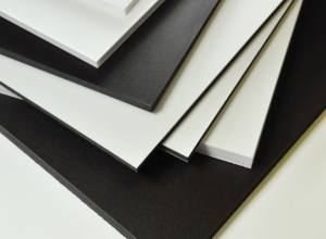 white and black foam board stack of white and black foam board