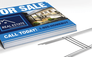 stack of yard signs and stakes on white background