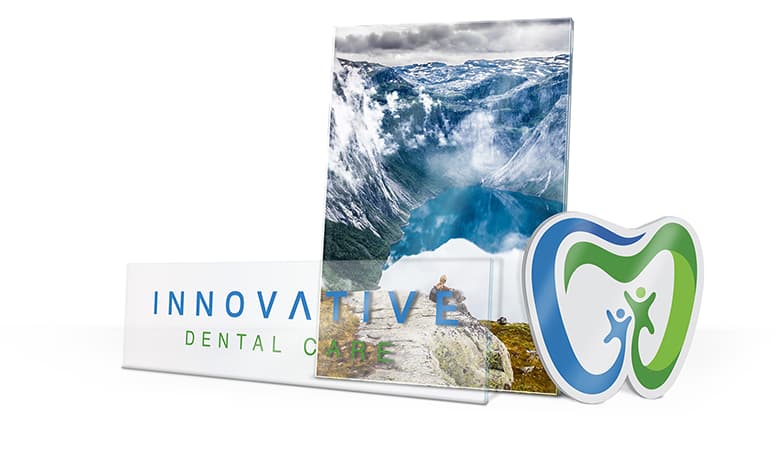 three examples of acrylic signage on white background