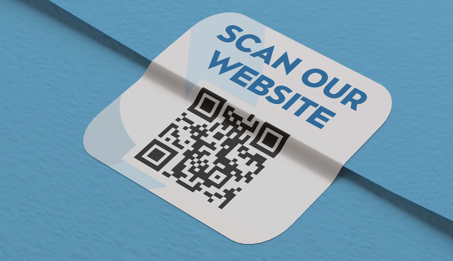 scan our website qr code sticker used on a wall