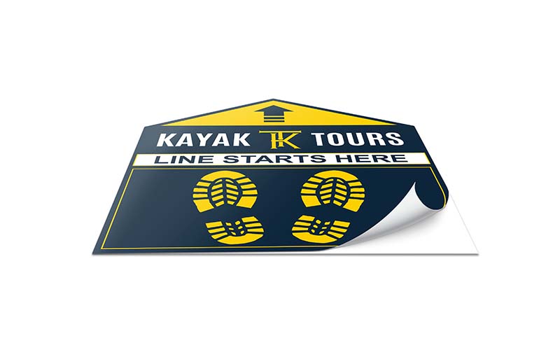 Blue Kayak tours line starts here with yellow boot footprints graphic