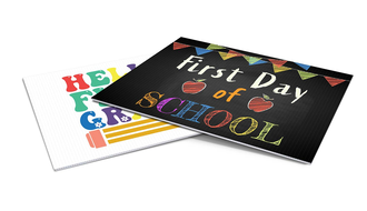 two first day of school signs
