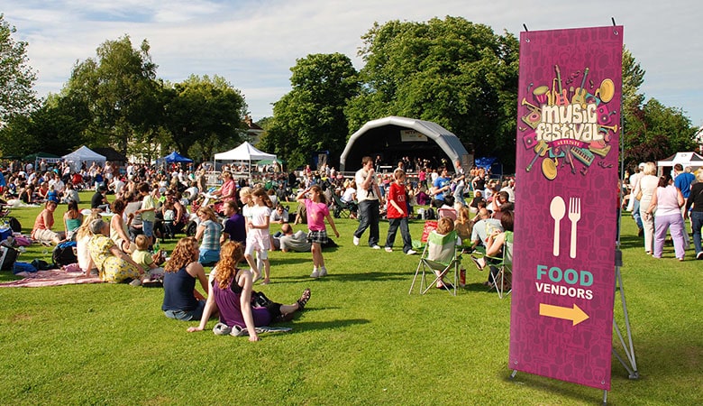 X banner on display at a festival
